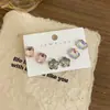 Joyería de Diamantes con Flor de Ciruelo Brillante de Nuevo Estilo, Diseño Geométrico Irregular Simple, Sensación de Lujo Ligero y Gama Alta, Múltiples Estilos de Aretes