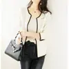 Abrigo redondo estilo Chanel para mujer 2023 Primavera y Otoño Nuevo cárdigan de moda francesa temperamento de socialité top suéter simple