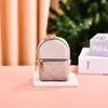 Nuevo mini monedero de PU mini lindo mochila pequeña bolsa para llaves bolsa para guardar cable de datos labial venta al por mayor de fábrica
