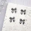 Accesorios Populares Transfronterizos para Arte de Uñas con Moño Dorado, Tendencia 3D de Lujo Ligero, Decoraciones para Uñas de Aleación con Cinta de Moño