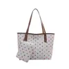 Conjunto de Dos Piezas de Polipiel con Lunares Transfronterizo Verano 2026 Nueva Moda Elegante Simple para el Trabajo Elegante Bolso Tote de Hombro