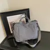 Bolsa de gran capacidad Shuai Mi Jia, nuevo bolso de hombro casual Otoño 2026, personalizado y simple, adecuado para la escuela y el trabajo, bolso tote