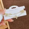 Pulseira Flor de Trevo de Quatro Folhas com Microincrustação de Madrepérola Doce e Estilosa, Pulseira Popular Tendência de Luxo Leve com Ajuste Deslizante para Mulheres