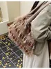 Bolso de Punto Estilo Étnico Transfronterizo para Mujer, Gran Capacidad, Nuevo 2026 Otoño e Invierno Versátil con Borlas para Hombro, Bolso Tote de Estudiante