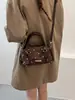 Bolso tote de ante de lunares de alta gama, nicho, para mujer, nueva colección otoño 2026, bolso de mano exquisito y versátil, bolso tipo almohada