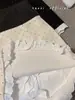 Nova Saia de Cintura Alta com Bolinhas e que Modela o Quadril Saia Evasê Estilo Doce Saia com Renda Costurada Saia Curta Roupa Feminina Primavera e Verão 2025