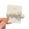 Pinza para el pelo de estilo coreano, exquisita, dulce, con lazo de perlas, forma de arco, pinza de pico de pato, pinza para flequillo, pasador diario, simple, versátil para mujer