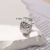 Joyería de comercio exterior al por mayor Moda europea y americana estilo Ins anillo geométrico de nicho para mujer titanio acero chapado en oro 18K anillo para dedo de comida