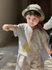 Conjunto Bebê e Criança Pequena 2026 Verão Novo Estilo Macacão Curto para Meninos Conjunto de Duas Peças Blusa Fina com Desenho