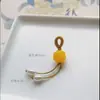 Precio mayorista directo de fábrica pulsera hecha a mano pulsera con colgante diy accesorios pequeños deslizantes colgante de garra de gato lindo Joker