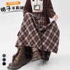 Saia Plaid Irregular para Mulheres Primavera 2026 Vintage Plaid Cintura Elástica Comprimento Médio Saia Evasê Que Cobre os Quadris e Parece Emagrecedora