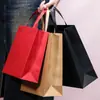Bolsa de mão vermelha grossa para presente de mão em estoque bolsa de mão de papel para casamento bolsa de mão de papel Kraft da moda bolsa de presente