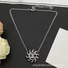 Collar Cruzado Chanel Doble C Nueva Colección, Auténtico con Etiquetas, Alta Calidad, Venta al por Mayor con Descuentos por Cantidad, Directo del Fabricante