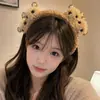 Pinza para el pelo linda y sofisticada para lavarse la cara, estilo nuevo de moda 2026, diadema de maquillaje, diadema de felpa de dibujos animados para otoño/invierno para un look de corona alta