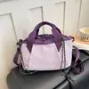 Bolsa de Lona Nueva Otoño 2026 Moda para Viajes Bolso de Mano Simple Moderno Toque de Lujo Bolso de Hombro Único para Mujer