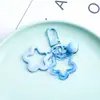 Colgante llavero de pentagrama doble creativo en stock con cascabeles de colores, accesorios para decoración de bolsos de mujer DIY hechos a mano