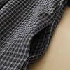Vestido de cuadros azul marino de manga larga, elegante, de nicho, de alta gama, nuevo estilo Primavera y Otoño 2026