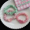 Anillo para el pelo pequeño de amor de niña estilo Chanel dulce cuerda para el pelo estilo coreano de amor para novia goma pequeña cuerda para el pelo de celebridad de internet