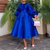 BN311 comércio exterior transfronteiriço roupas femininas europeias e americanas outono e inverno novo cor sólida brilhante solta botão manga lanterna vestido