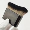 Cepillo negro multifuncional de gran venta transfronteriza, cepillo corporal de pelo suave, cepillo plano grande, cepillo para rubor y otras herramientas de belleza.