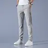 Ropa de Hombre Xintang 2026 Verano Nuevos Pantalones Casuales, Delgados Elásticos de Seda de Hielo Ligeros Pantalones Largos de Negocios Casuales, Venta al por Mayor