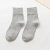 Calcetines de moda para mujer primavera y otoño Corea del Sur Japoneses de algodón peinado media pantorrilla color sólido negro desodorante rectos de caramelo