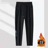 Pantalones deportivos elásticos de alta gama para hombre para otoño e invierno, talla grande, estilo de negocios, forrados de polar, resistentes a las arrugas, holgados de pierna recta, joggers casuales