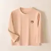Camiseta de manga larga de algodón puro Youzhuang para niños, otoño e invierno, 280g, camiseta interior cálida de color caramelo para niños y niñas, ropa de otoño para bebés