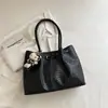 Bolsa feminina de grande capacidade para uso transfronteiriço, nova coleção outono 2026, bolsa de ombro versátil e elegante, bolsa tote moderna e casual para o trabalho e uso diário