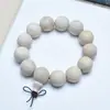 Pulsera de cuentas redondas de madera de alcanfor natural sección de bambú verde negro pareja simple cuentas de Buda rosario cuentas de oración joyería al por mayor