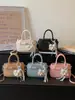 Moda de Verano Transfronteriza 2026 Tendencia Casual Popular Bolso de Mano para Mujer, Bolso de Hombro, Bolso Cruzado Tipo Cubo