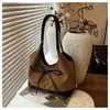 Bolso de Cubo Retro Nicho Versión Coreana Transfronterizo 2025 Nuevo Bolso de Cubo Simple Versátil Bolso de Hombro Personalizado Moderno