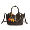 Elegante y estiloso bolso de mano tipo cesta Henggeng, nuevo modelo de moda versátil para uso casual, bolso de hombro y cruzado
