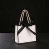 Bolsa de papel de mano con lazo, bolsa de regalo de boda, caja de dulces en blanco de Phnom Penh, bolsa de regalo pequeña transfronteriza