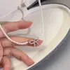 Collar de Perlas con Lazo Shijia para Mujer, Cadena para Clavícula de Circonita de Moda Tendencia, Cadena para el Cuello de Diseño Niche de Lujo Ligero
