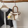 Bolsa de Mão Transversal Estilo Balde Color Blocking Tendência Nicho 2026 Novo Estilo Versátil Casual Pequena para Mulheres