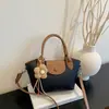 Bolsa Transversal Feminina Versão Coreana 2026 Nova Moda Bolsa de Ombro para Mulheres Versátil Bolsa de Mão para o Dia a Dia Atacado