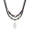 Nuevo Collar Trenzado de Cuero de Doble Capa Colgante de Xizang Cadena de Suéter de Madera Trenzada Estilo Bohemio Collar Largo
