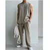 Chaleco de canalé sin mangas con cuello redondo negro para hombre 2026 Nuevo estilo coreano Moda Elegante Holgado Casual Pantalones Conjunto de dos piezas