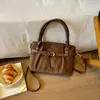 Bolsa de mão retrô, de nicho e estilo descontraído: Coleção nova outono 2026, bolsa tote pequena de camurça, bolsa de ombro simples, bolsa transversal