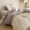 Juego de ropa de cama de lujo para bebé estilo francés: juego de cuatro piezas con funda de edredón y sábana de terciopelo de leche de pelo corto, perfecto para el calor del otoño y el invierno