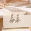 Pendientes de Perla Coreanos de Alta Gama 2026, Aguja de Plata Estilo Vintage Chanel, Diamante Multicolor Estrella de Ocho Puntas, Pendientes de Botón, Venta al por Mayor