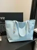 Bolso de Hombro de Lona Simple a Cuadros con Letra de Moda Transfronterizo para Mujer 2026 Nuevo de Gran Capacidad para Hombro o Axila de Moda