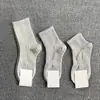 Calcetines antibacterianos de 10A de longitud media y corta para hombre y mujer, con suelas de masaje, color liso, transpirables, resistentes al olor, absorbentes de sudor, calcetines deportivos casuales para todas las estaciones