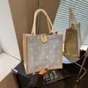 Bolsa de lona estilo INS para mujer, adecuada para llevar loncheras al salir, bolso pequeño de moda 2026 para el trabajo