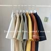 Camisa de manga corta de color liso de verano para hombre, estilo japonés, holgada, de media manga, estilo Hong Kong, blanca, moderna.