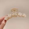 Diseño nicho de alta gama Camelia clip grande clip para mujer adorno para la cabeza horquilla para el cabello parte trasera de la cabeza horquilla clip de tiburón