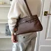 Moda retro japonesa nicho 2026 nuevo bolso de mano coreano de gran capacidad para mujer, bolso de hombro y axila de otoño