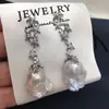 Brincos de Pérola de Água Doce Naturais Estilo Cauda de Peixe de Zhuji para Mulheres, Brincos de Pérola Elegantes Estilo Estrela-do-Mar Únicos Venda por Atacado