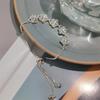 2025 Pulsera de Perlas Más Vendida para Mujer Versátil Gama Alta Nuevo Estilo Chino Retro Pulsera de Mano Temperamento Joyería de Mano Mariposa Venta al por Mayor